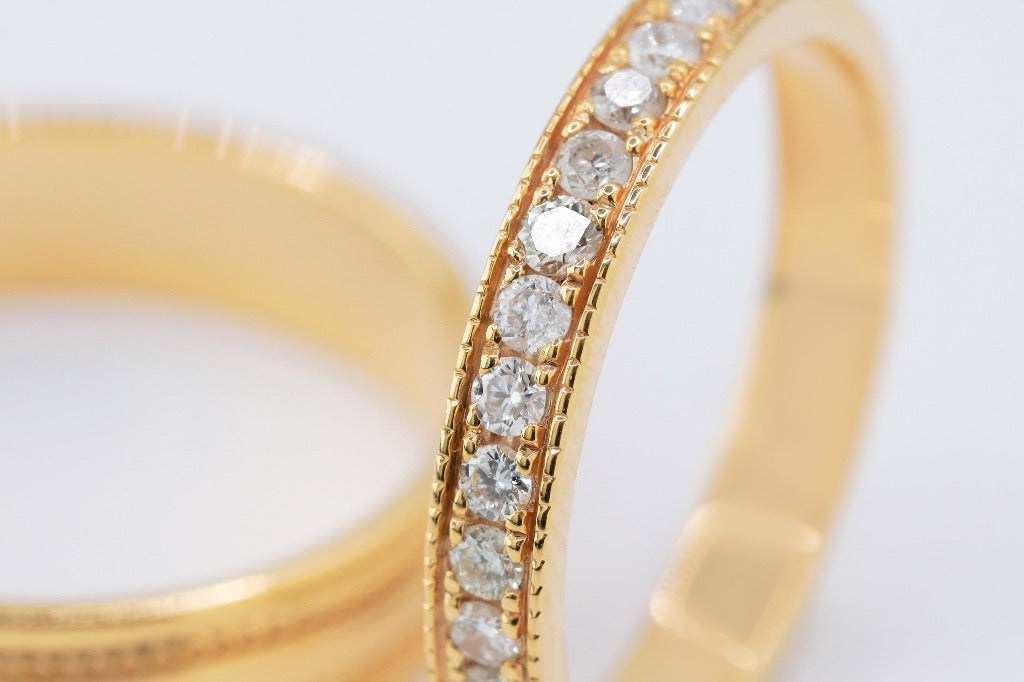 Bride: .02ct- 12pcs With milgrain Stone setting: Pave setting Groom: with milgrain, plain band