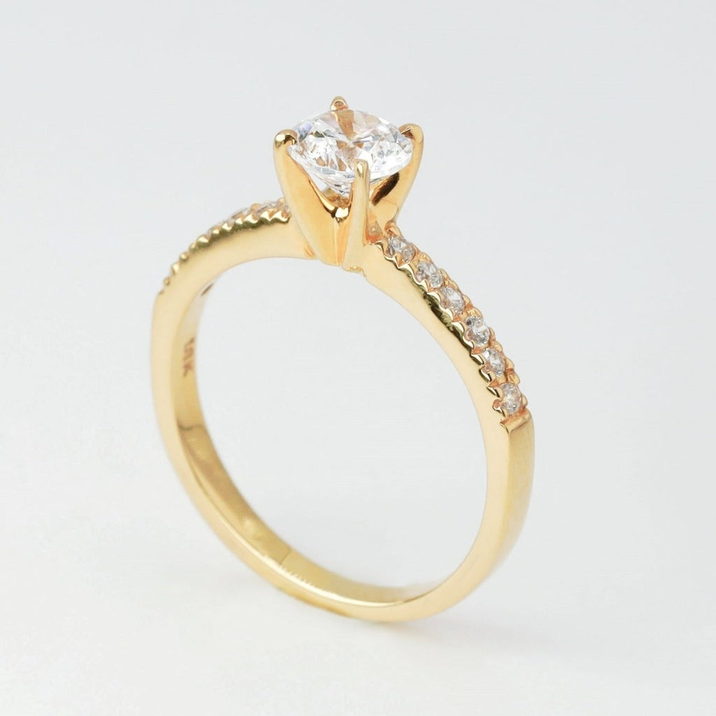 Round brilliant cut with 1ct center stone and .01ct sides stones in timeless pave setting. The stone in the photo is swiss stone by default. You can definitely upgrade your stone into moissanite or genuine diamond with GIA certification. Grams Approx: 3