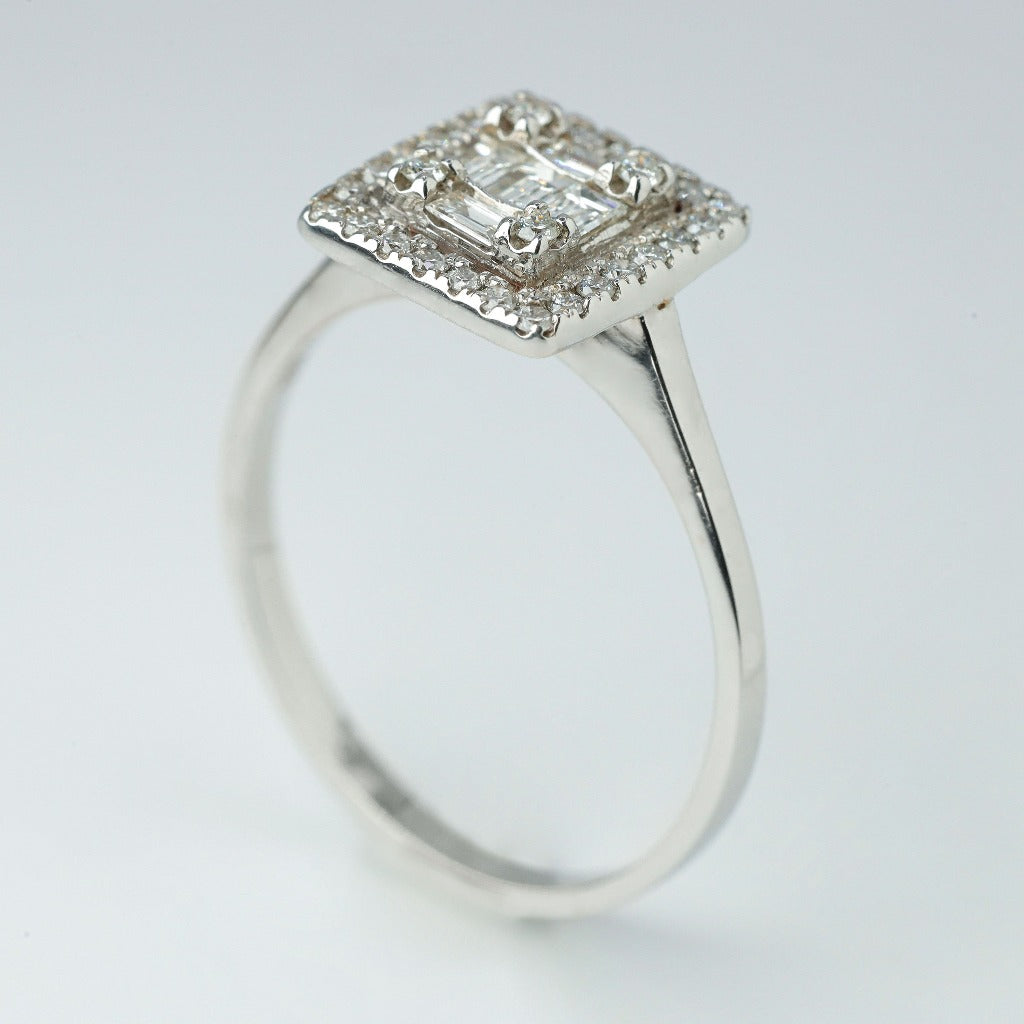 .03ct- 3pcs, center, baguette .02ct- 2pcs, center, baguette .01ct- 4pcs, center, round cut .008ct- 24pcs, halo, round cut