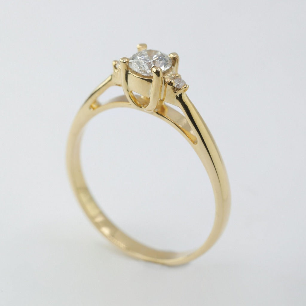 Round brilliant cut with .50ct center stone in classic solitaire setting. The stone in the photo is swiss stone by default. You can definitely upgrade your stone into moissanite or genuine diamond with GIA certification. Grams Approx: 3