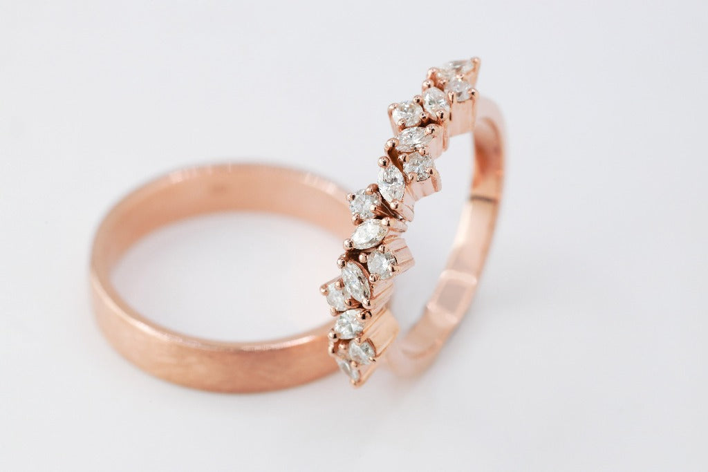 Groom: Plain band, glossy finish Bride: .04ct - 8pcs, marquise cut, genuine diamond .03ct - 7pcs, round cut