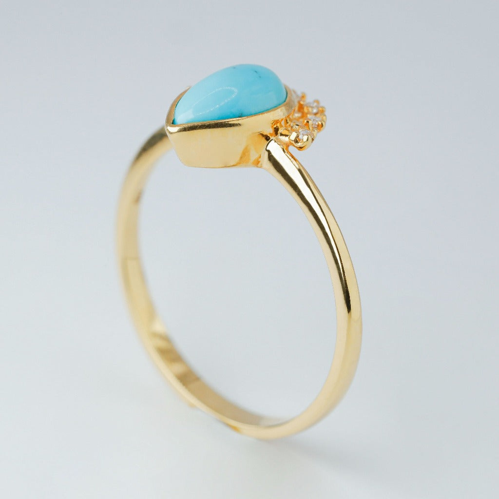 1ct- center, pear cut, turquoise gemstone .005ct- 12pcs