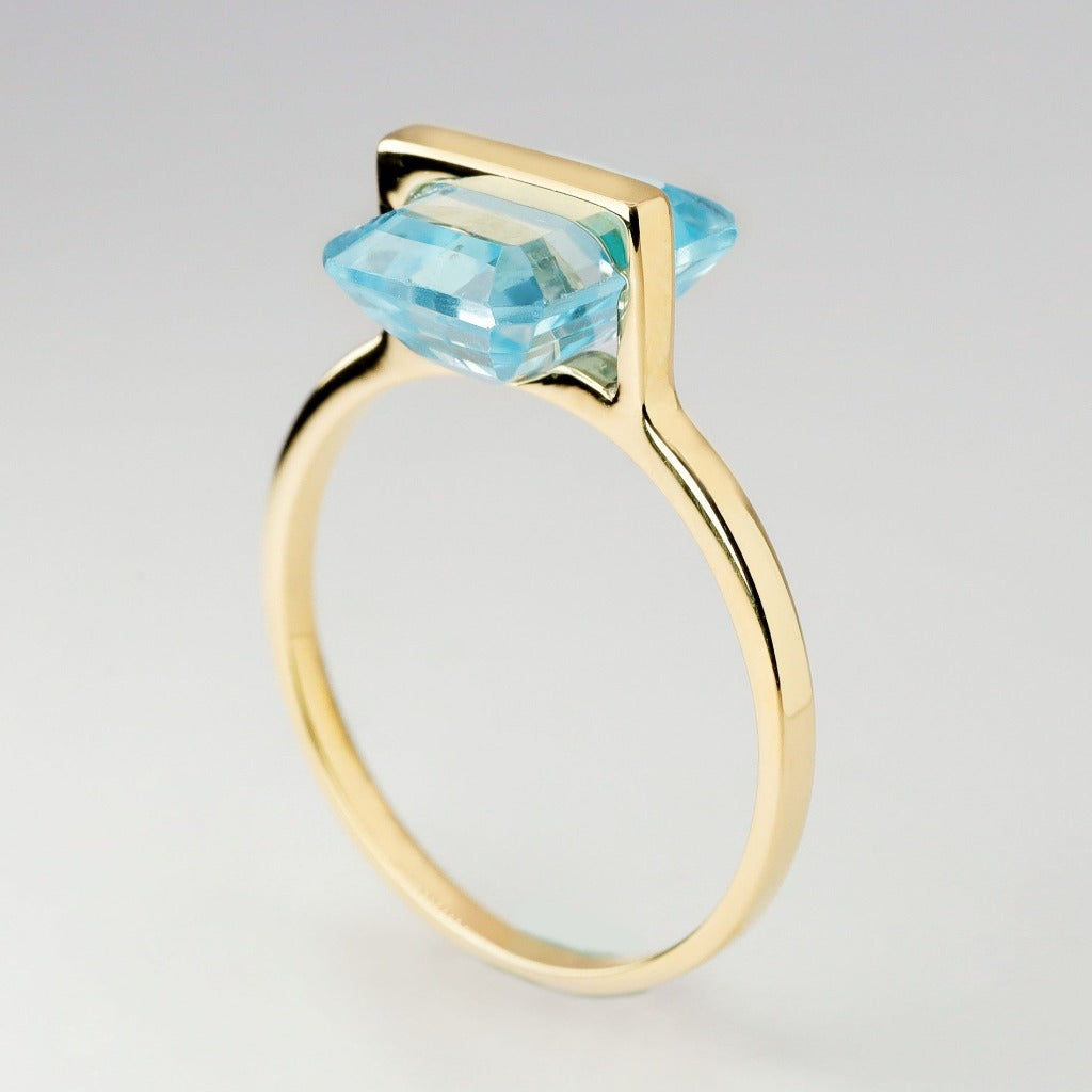 3ct- center, emerald cut, aquamarine gemstone
