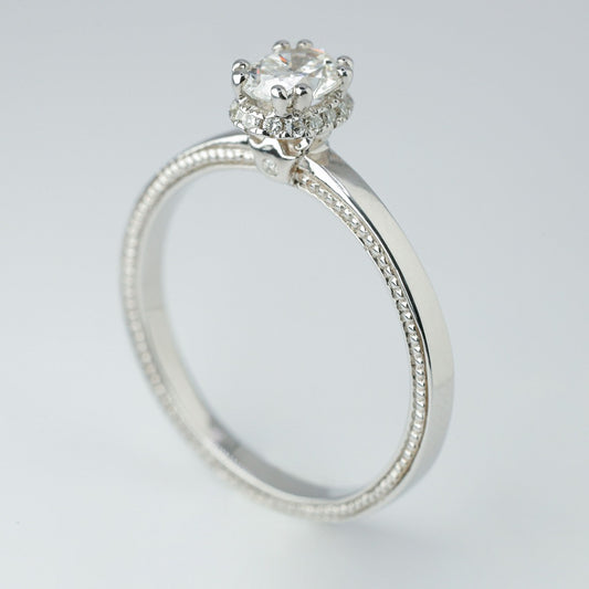 .50ct- center, oval cut .005ct- 23pcs, round cut