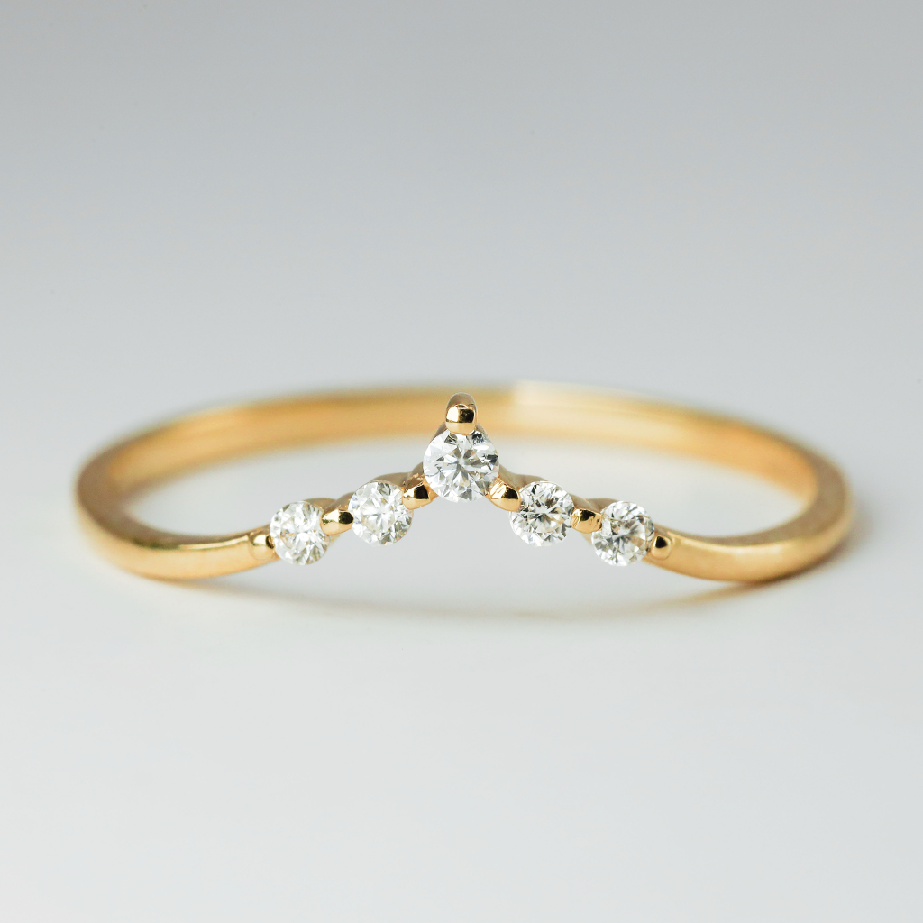 1.7mm - 1pc, center, moissanite 1.5mm - 4pcs, moissanite Total of .078ct