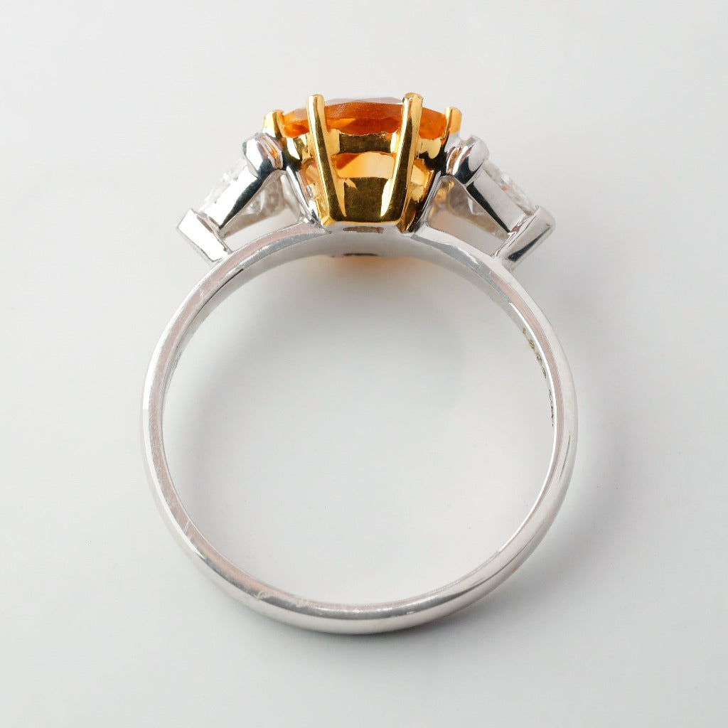 2ct- center, cushion cut, orange topaz gemstone .20ct- 1pc each side (2pcs in total), trilliant cut