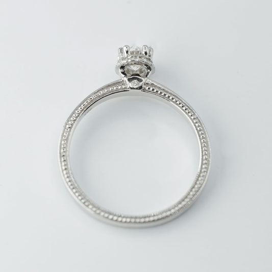 .50ct- center, oval cut .005ct- 23pcs, round cut