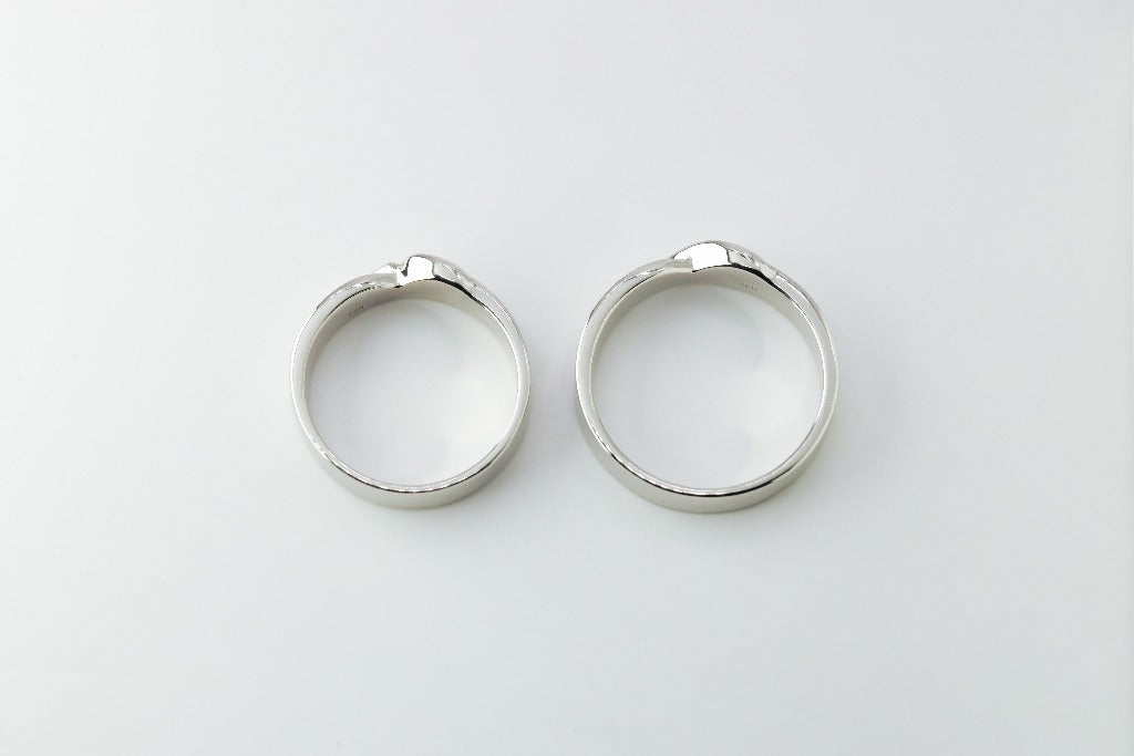 Groom: Plain with twisted Bride: .02ct- center .005ct- 8pcs