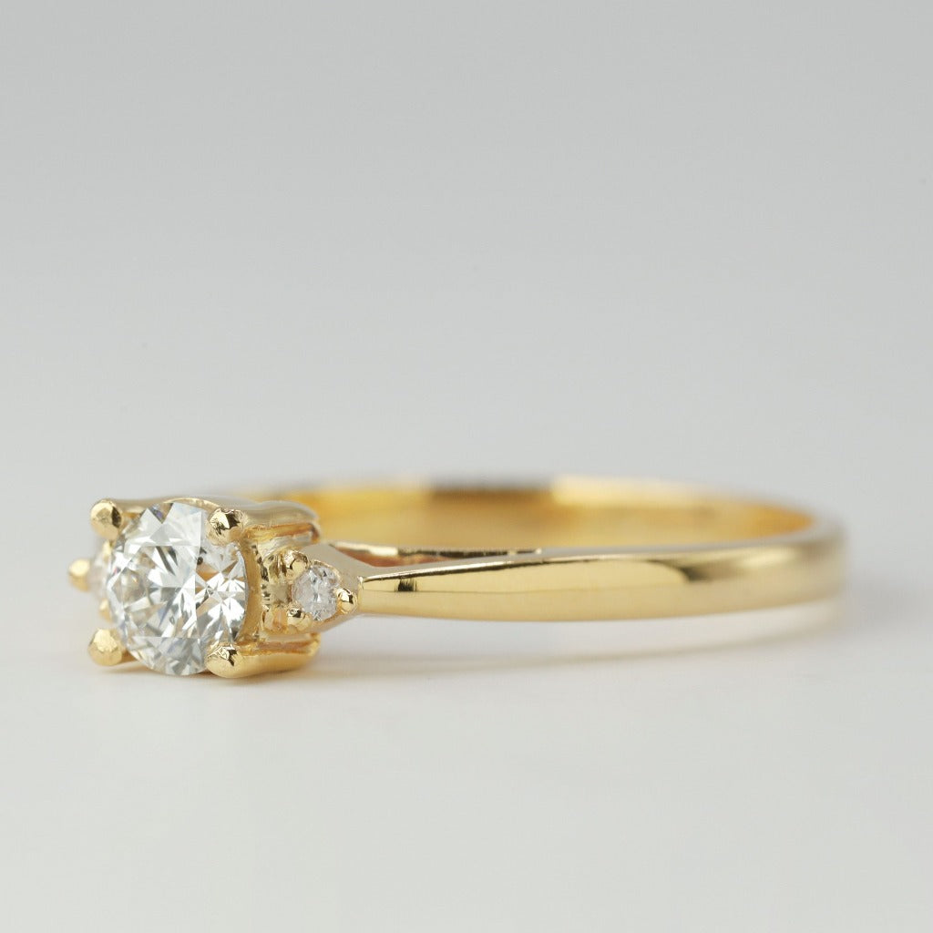 Round brilliant cut with .50ct center stone in classic solitaire setting. The stone in the photo is swiss stone by default. You can definitely upgrade your stone into moissanite or genuine diamond with GIA certification. Grams Approx: 3