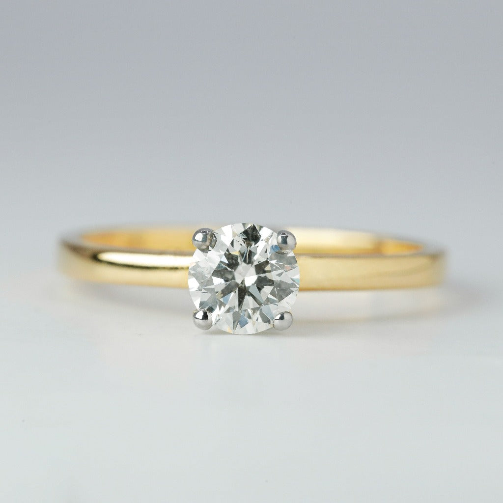 .50ct- round cut .005ct- hidden halo