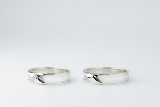 Groom: Plain with twisted Bride: .02ct- center .005ct- 8pcs