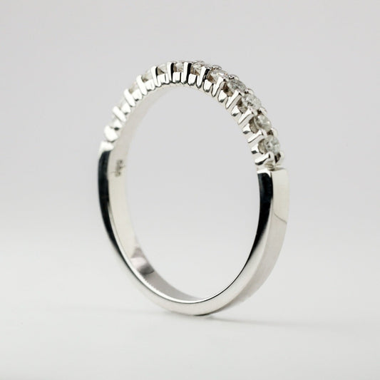 Round brilliant cut with .02ct center stone in eternity setting. The stone in the photo is swiss stone by default. You can definitely upgrade your stone into moissanite or genuine diamond with GIA certification. Grams Approx: 3