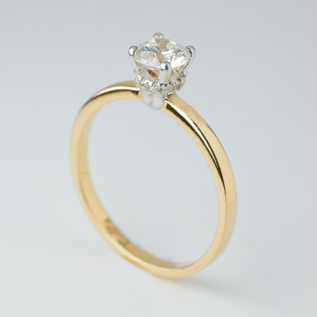 .50ct- round cut .005ct- hidden halo