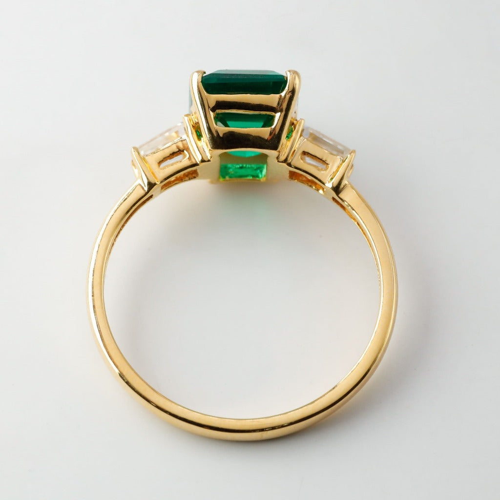 3ct- center, emerald cut, emerald gemstone .25ct – tapered baguette